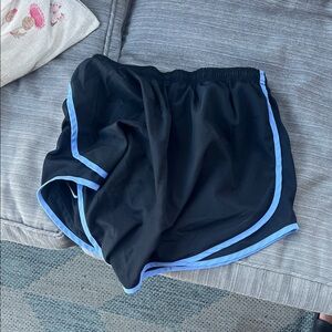 Nike Women's Black Athletic Shorts with Blue Accents